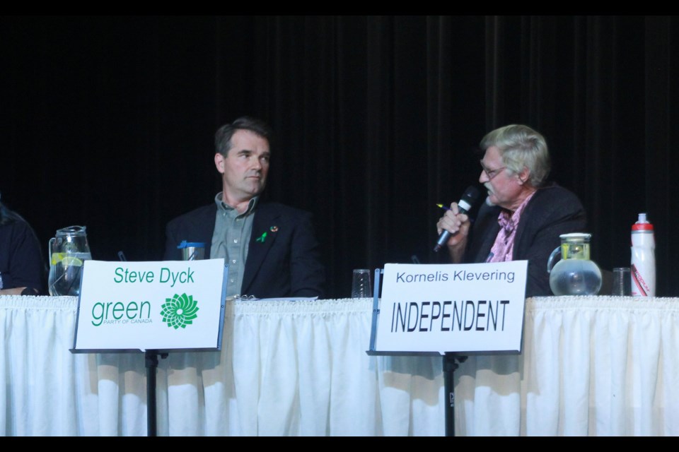 Independent candidate Kornelis Klevering rebuts Green Party of Canada candidate Steve Dyck point. Anam Khan/GuelphToday