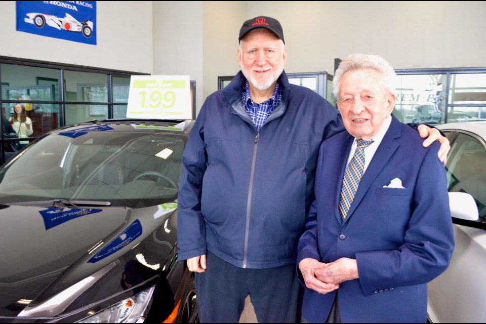 Gerry Kowalsky with the owner of Olympic Honda, David Brewis. Troy Bridgeman/GuelphToday
