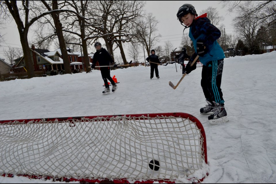 Neighbourhood kids play hockey at Sunny Acres rink. Troy Bridgeman/GuelphToday