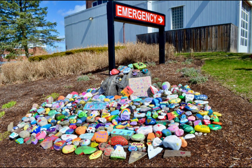 Hand-painted stones outside Guelph General Hospital offer thanks and encouragement to frontline workers. Troy Bridgeman/GuelphToday