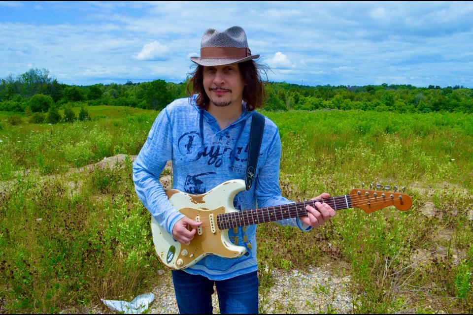 Guitarist Adrian Raso is tired of streaming services giving his music away for free so he is giving his new record The 8 Track Sessions away for free himself. Troy Bridgeman/GuelphToday