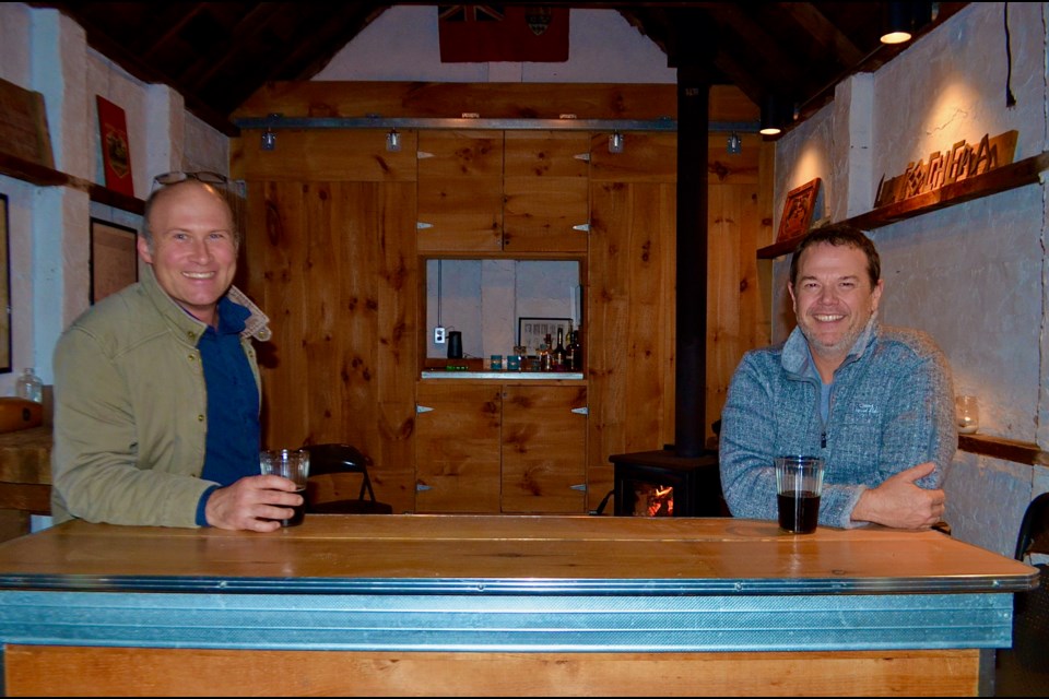 Bill Harvie and Todd Craig enjoy a cold home brew in La Cochera, home of the Central Street Gentlemen’s Club where they launched their historic quest. Troy Bridgeman for GuelphToday