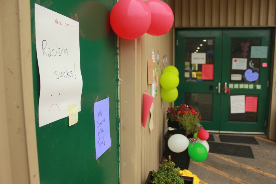 Messages of support, balloons and flowers were placed at the entrance of the Muslim Society of Guelph on Water Street after an alleged racist incident last week against two Muslim men. Anam Khan/GuelphToday