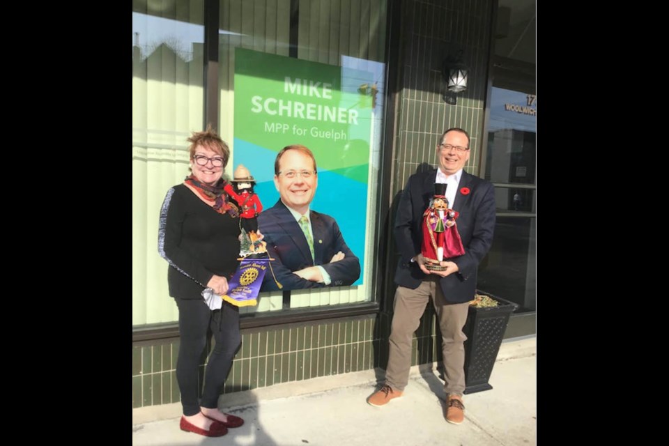 Sharron Riley-Persson, avid Nutcracker collector stands beside MPP Mike Schreiner holding Merlin the magician while she holds Merlin's bodyguard. Supplied photo