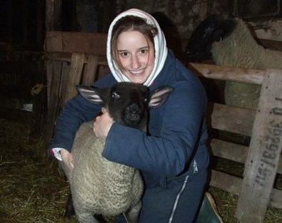 Late Jennifer Kovach pictured here with a sheep shows her love for animals. Friends of the fallen police officer are raising funds to name a plaque after her at the Guelph Humane Society to honour her memory. Supplied photo
