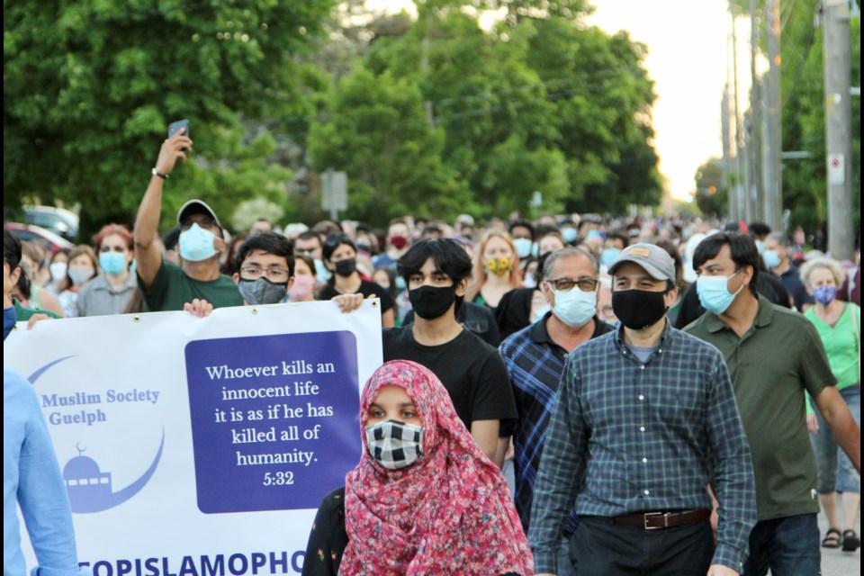 Over 1,200 people attended the MSOG's vigil and march on Thursday to remember the lives lost in London on Monday and to speak out against Islamophobia. A man holds a verse from the Quran, "Whoever kills an innocent life, it is as  if he has killed all of humanity." 5:32. Anam Khan/GuelphToday