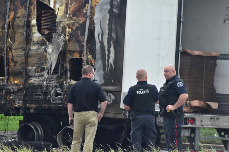 Police on scene after a trailer truck caught fire on Clair Road. Daniel Caudle/GuelphToday