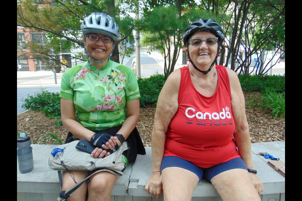 (left to right) Catherine  Reinhardt and Cheryle Cook take part in the Bike month kick-off festivities at Market Share in Guelph on Saturday.                             