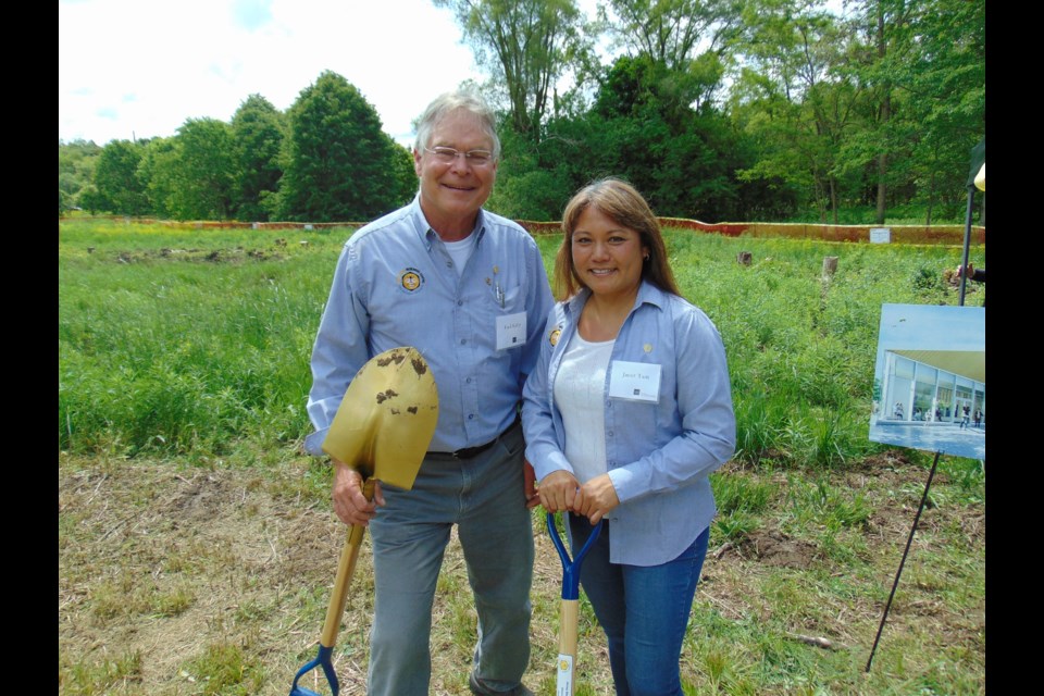 Paul Kelly, research and apiary manager, and Honey Bee Research Centre assistant Janet Tam.                               