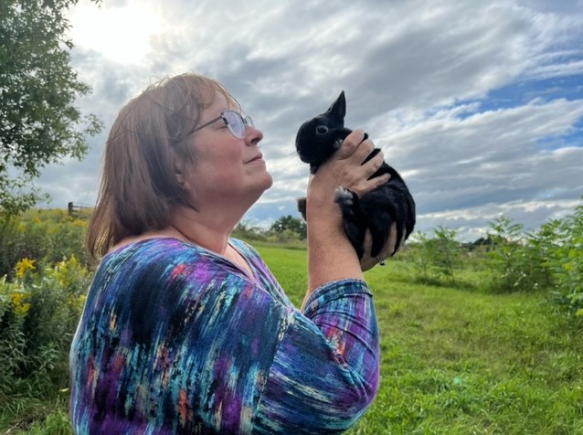Julie Martin with one of her rabbits at Smokey Hollow Farm in Hillsburgh.  