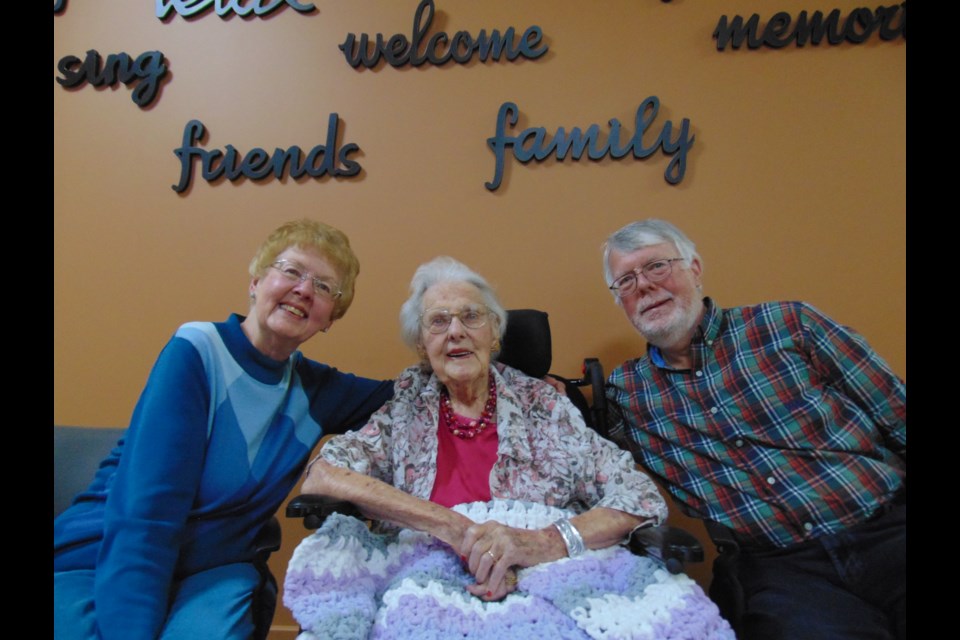 Carol Fay, Margaret MacIntosh, and Howard MacIntosh.                               