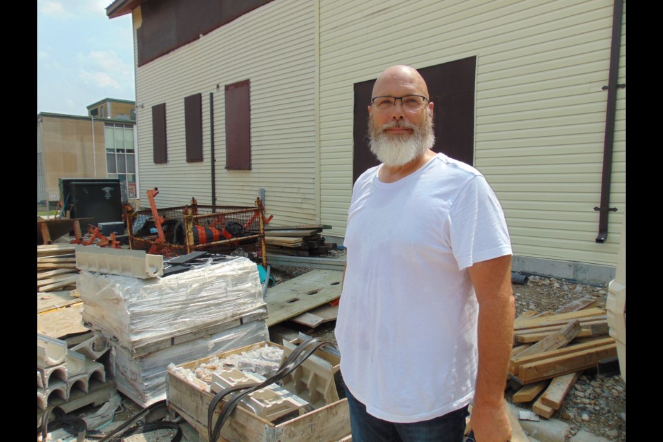 Mike Salisbury, chair of the Guelph Centre for Visual Art, outside of the former Guelph drill hall building.                             