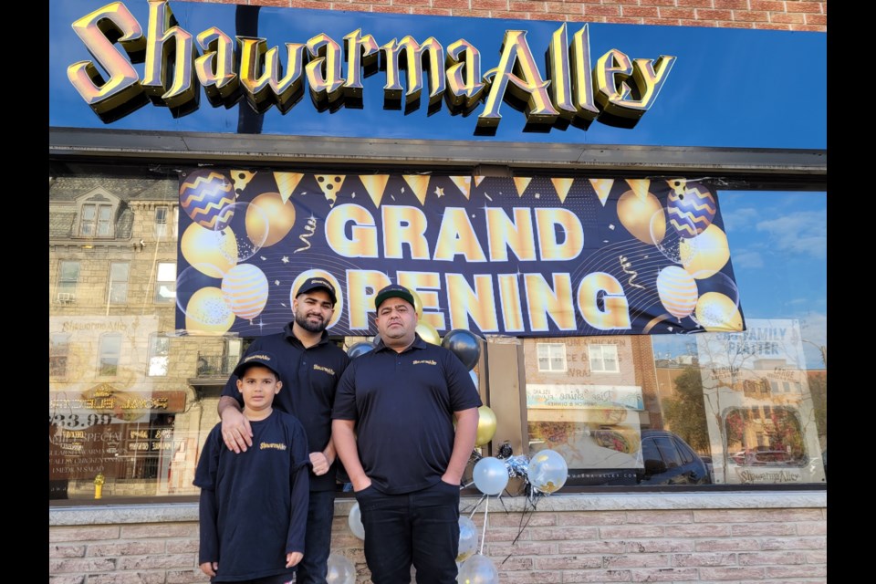 Yudhveer Singh, from left, with co-owners of Shawarma Alley in Guelph, Gagan Chaudhary and Harpreet Singh. 