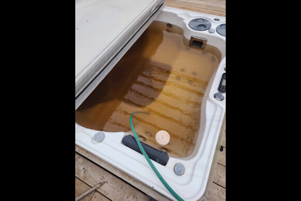 Arthur resident Eddie Baratto was shocked by brown water and sediment while filling his hot tub two weeks ago