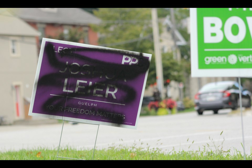 Sign of Guelph's PPC candidate Joshua Leier on Norwich Street near the intersection of Norfolk Street and Norwich Street is vandalized. Seen on Thursday. 