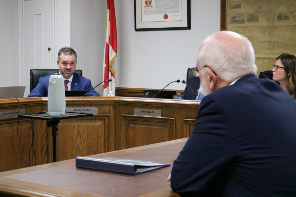 Mayor James Seeley addresses Bruce Taylor following his delegation.