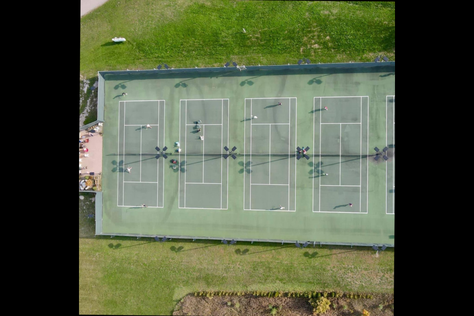 An overhead view of the four usable courts at Erin Tennis Club