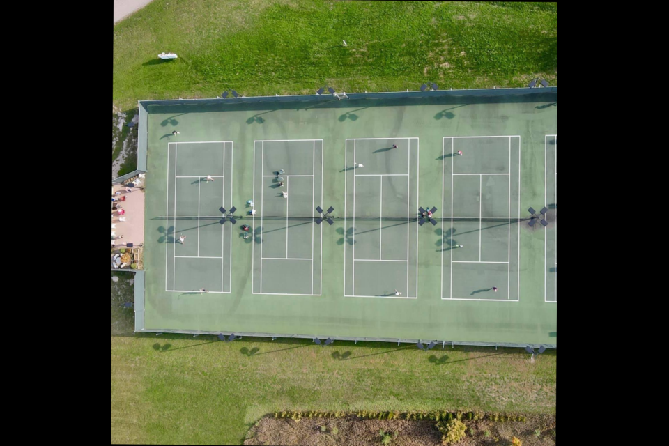 An overhead view of the four usable courts at Erin Tennis Club.