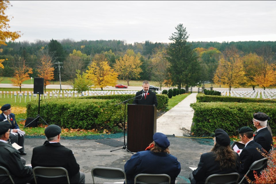 Warden Kelly Linton speaking at the Remembrance Ceremony on Friday.