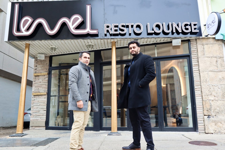 Milad Adibi Seden (left) and Faizan Shaban (right) stand in front of their restaurant, Level Resto Lounge. Ariel Deutschmann/GuelphToday