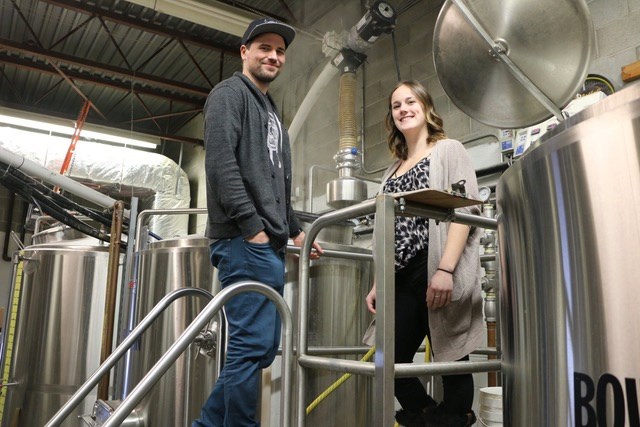 True Grist Homebrew Club members Ryan Dunlop (left) and Christina Burbadge at the 2019 Northern Ontario Micro Brew Festival. Submitted photo