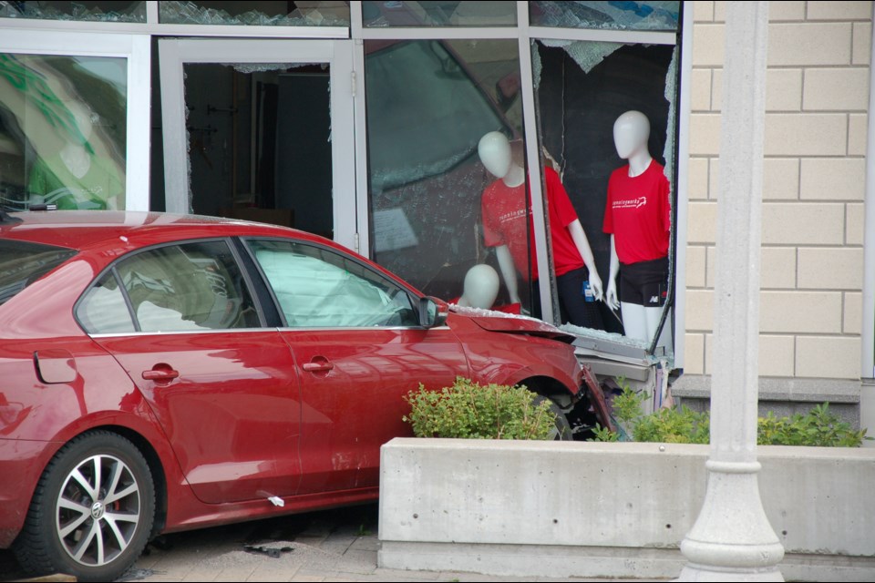 A car crashed into the front of Running Works on Gordon Street, just south of Wellington Road, on Friday afternoon.