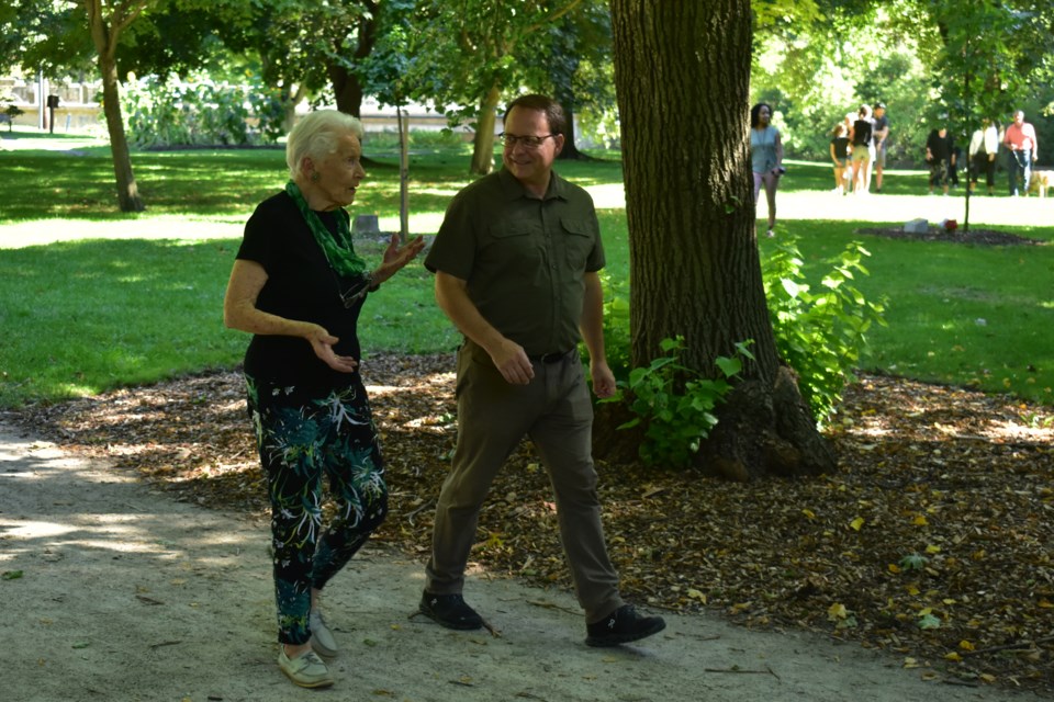 Orpha Thrasher and MPP Mike Schreiner are off for the first of Thrasher's 100 walks.