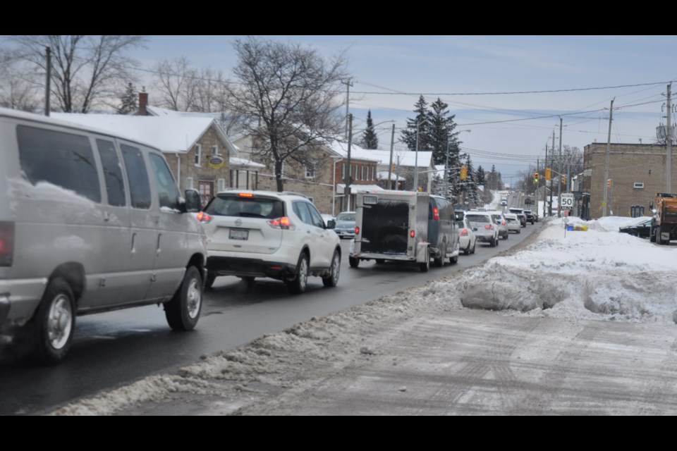 Cars passing through Highway 6 South in Morriston during morning rush hour