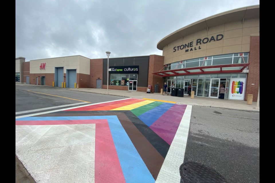 The new rainbow crosswalk leading to the Stone Road Mall entrance. 