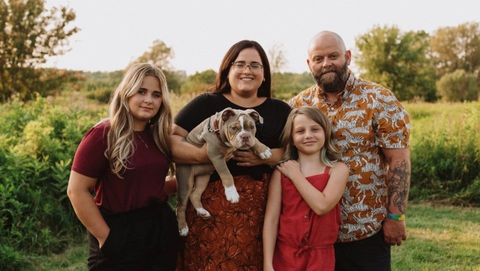 The Somerville family from left, Mattea, mother Michelle, family dog, younger sister Dash, and father Jake.