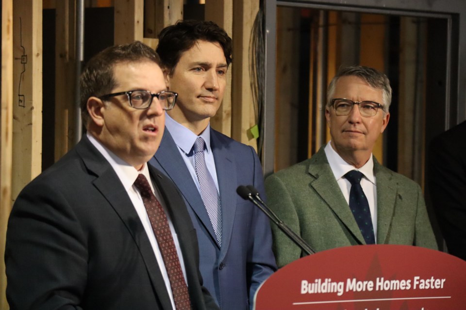 Mayor Cam Guthrie, Prime Minister Justin Trudeau and Guelph MP Lloyd Longfield announcing the launch of the federal housing accelerator fund at Grace Gardens on 721 Woolwich St.