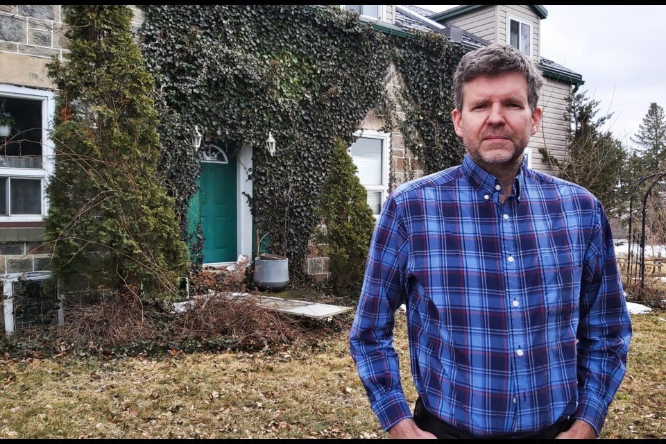 David Brandow stands in front of his home at 5050 Whitelaw Rd. He's appealing an expropriation effort by the County of Wellington.