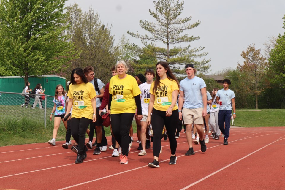 Cancer survivors lead the way in the 2023 Relay for Life at St. James Catholic High School on Friday. The participants managed to raise $50,656 and surpassed their $45,000 goal. All the fundraising money goes toward the Canadian Cancer Society.