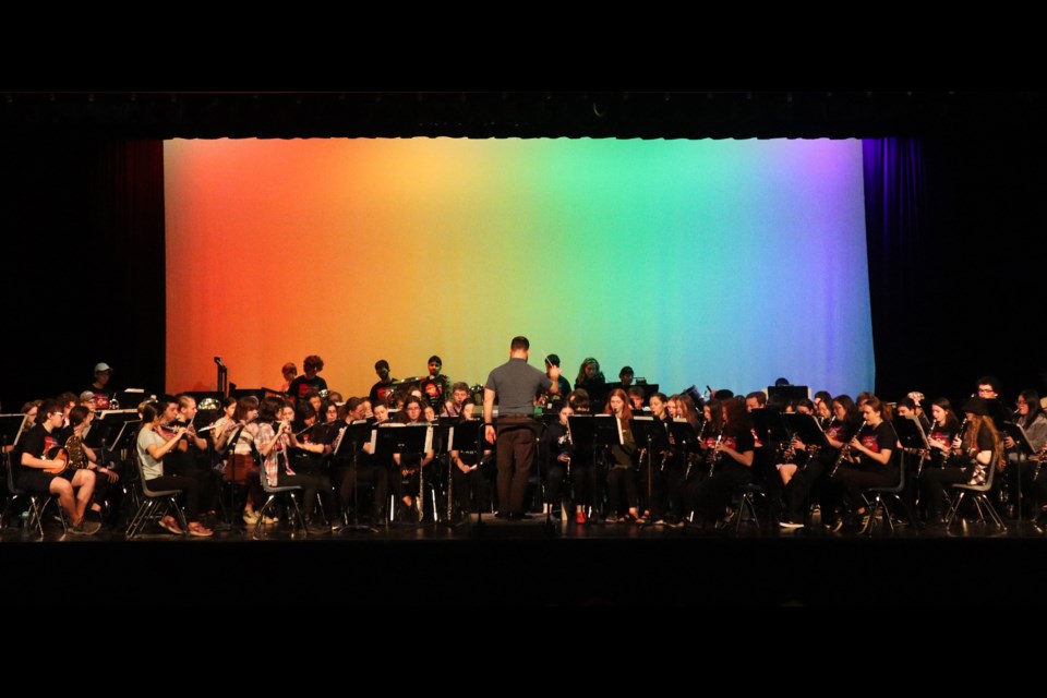 Rainbow lighting floods the backdrop as UGDSB high school students rehearse Friday for their concert on Saturday at 7 p.m. at J.F. Ross. Donations will be accepted at the doors and the proceeds will go to 2SLGBTQI organization EGALE. The UGDSB Pride & Inclusive Concerts features Grade 10 to 12 students from J.F. Ross, Centennial and GCVI. Two compositions are by composer and conductor Randall Standridge.