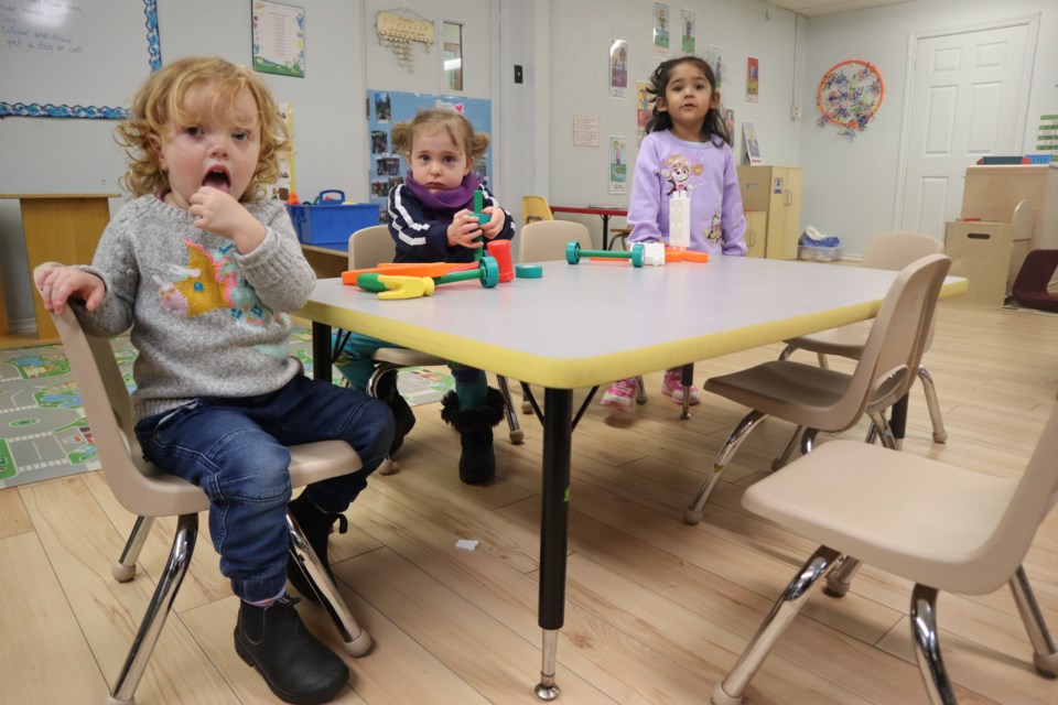 Flora, Shannon and Serena at the end of the school day at Lilliput Land Nursery School.