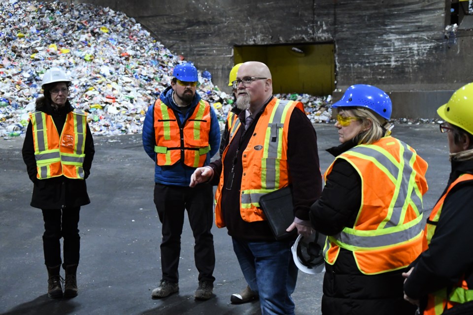 Solid waste division manager Cameron Walsh fields questions for city council members during a tour of the Waste Resource Innovation Centre on Wednesday evening.