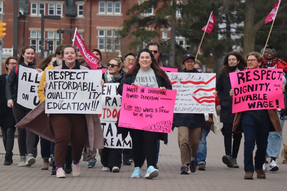 About 30 people marched to Branion Plaza at the University of Guelph on Saturday.