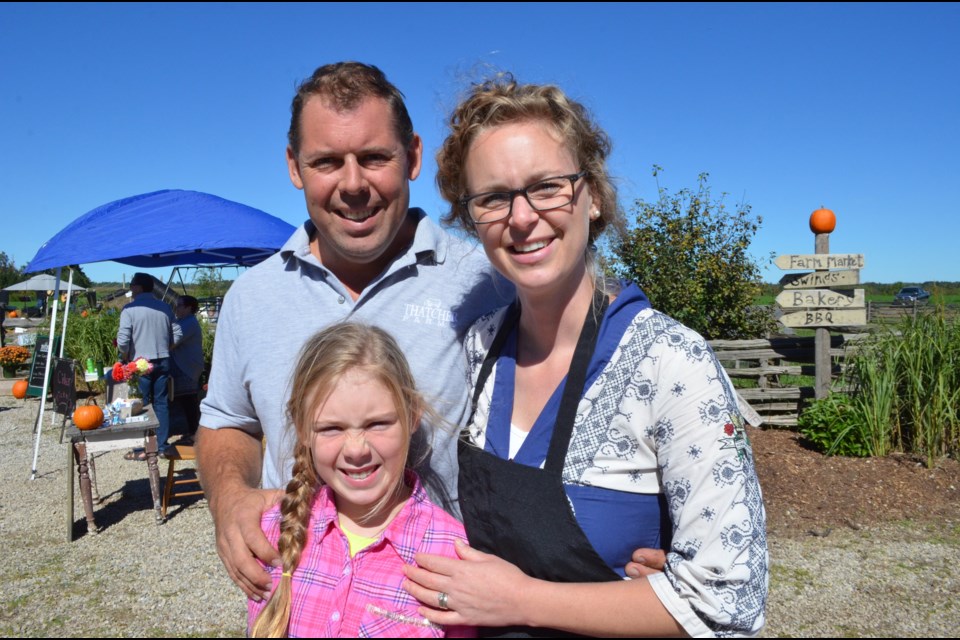 Adam and Dana Thatcher, owners of Thatcher Farms, with their daughter Sophie in 2016. GuelphToday file photo