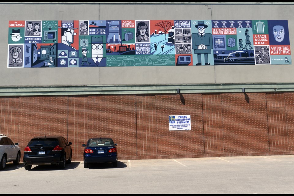 A new art installation by noted Guelph illustrator Seth adorns the wall of the Bookshelf. Tony Saxon/GuelphToday