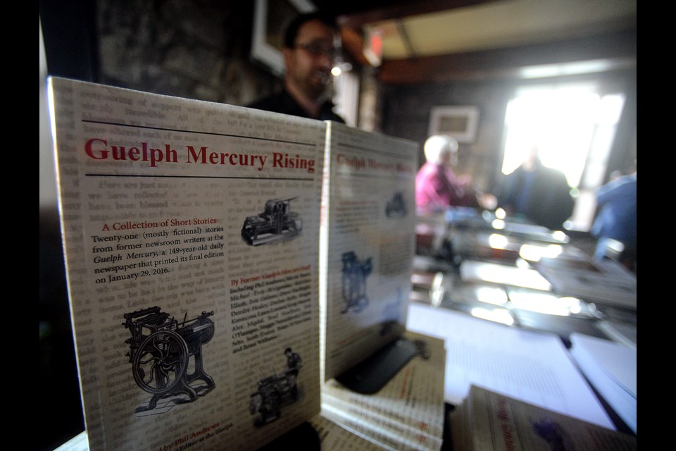 Jeremy Luke Hill of Guelph's Vocamus Press sells copies of Guelph Mercury Rising at its launch Saturday, May 13, 2017, at the Albion Hotel. Tony Saxon/GuelphToday