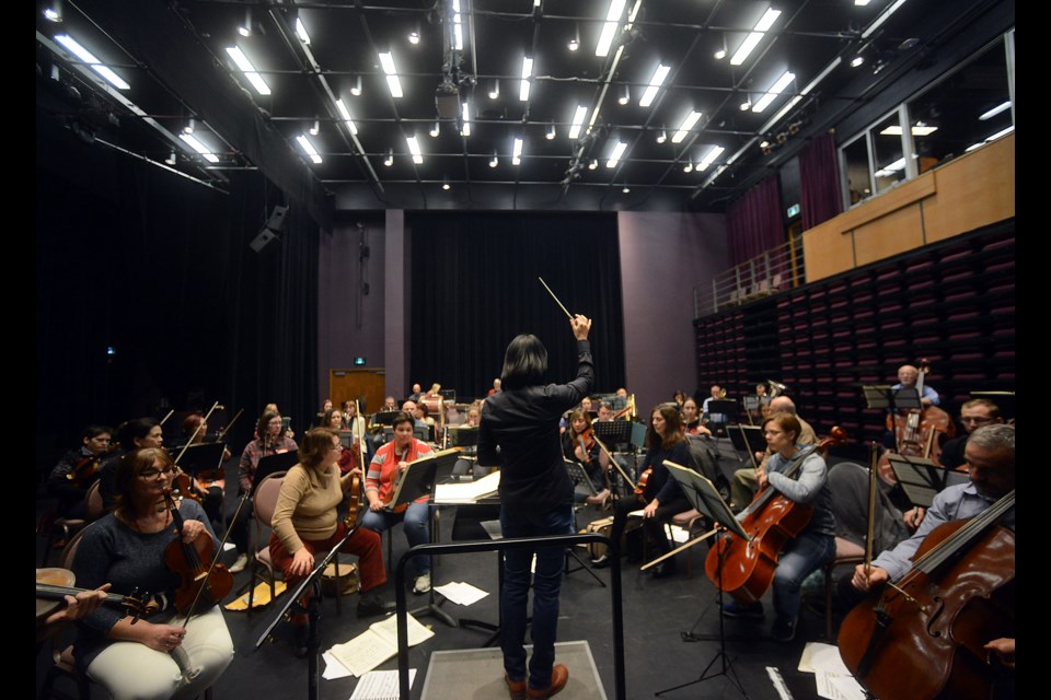 Artistic Director Judith Yan puts the Guelph Symphony Orchestra through a rehearsal at the River Run in advance of its Dec. 11 performance. Tony Saxon/GuelphToday
