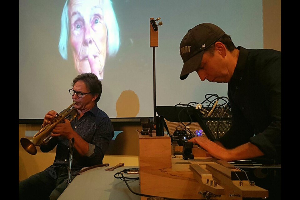 Gary Diggins plays trumpet while Mark Korven plays the apprehension machine Saturday, Sept. 16, 2017, at Silence. Zoey Ross for GuelphToday.com