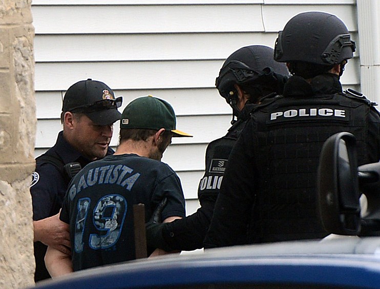 A man is taken into custody at 62 Yarmouth St. Thursday, Aug. 17, 2017, following a seven hour standoff with Guelph Police. Tony Saxon/GuelphToday