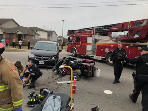Photos show the accident seen on Grange Road Sunday after a motorcycle and mini-van collided. Submitted photo