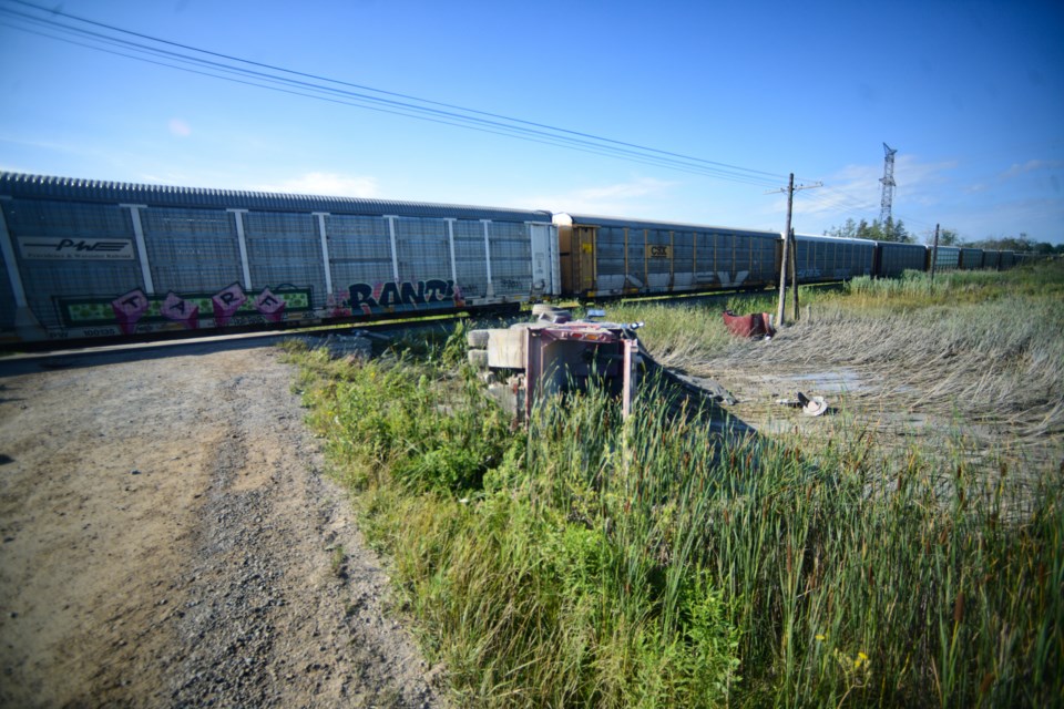 A dump truck and freight train collided on a rural road south of Guelph Wednesday morning. Tony Saxon/GuelphToday