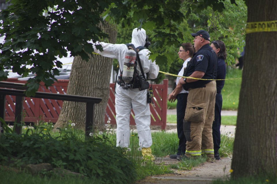 Emergency personnel talk at the scene of an investigation on Hayes Avenue Thursday morning. Kenneth Armstrong/GuelphToday