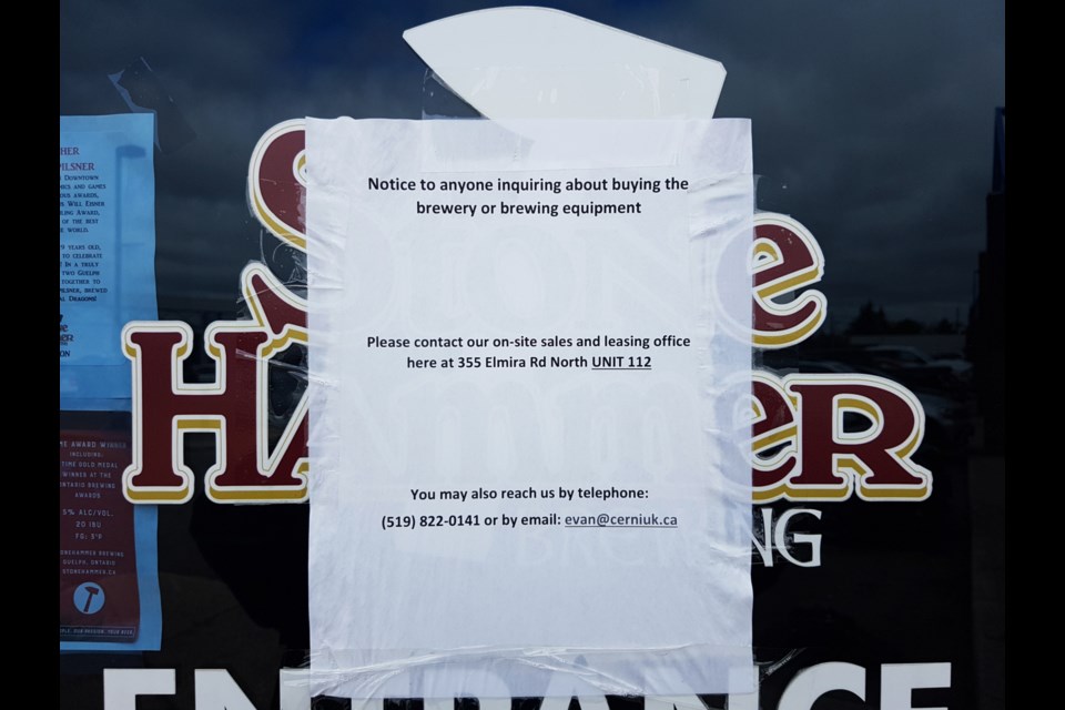 A notice on the door of StoneHammer Brewing on Elmira Road says the company is in bankruptcy proceedings. GuelphToday photo