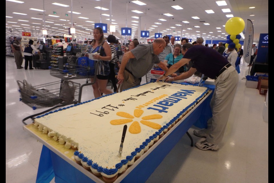 A really big cake to mark the opening of the 1,199th Walmart store. (Rob O'Flanagan/GuelphToday)