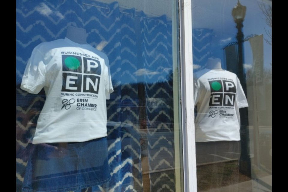 New To You on Erin's Main Street shows the t-shirts that indicate the downtown is still open for business as construction will likely see some challenging times this summer.