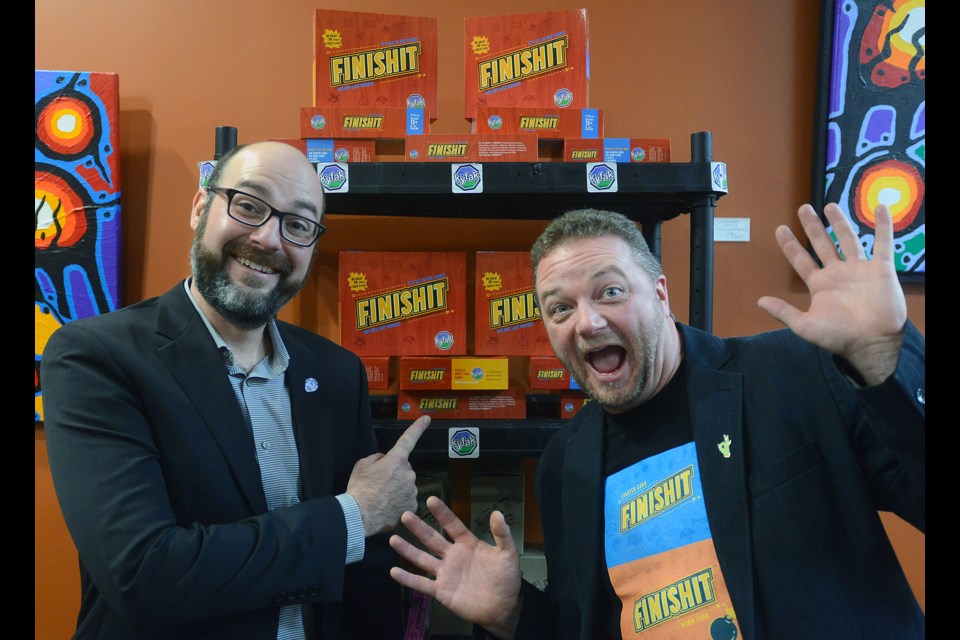 Guelph entrepreneurs Jeff Huber, left, and Jamie Doran launched their new board game FINISHIT at The Boardroom Cafe on Wyndham Street on Saturday, Dec. 3, 2016. Tony Saxon/GuelphToday